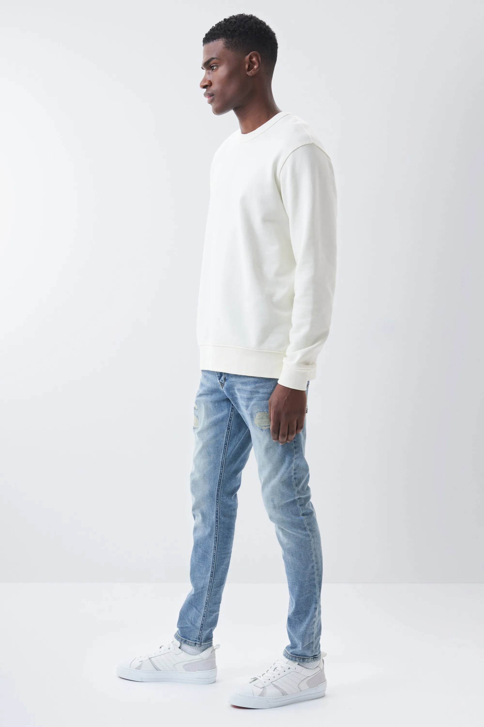 Jean skinny S-Resist avec déchirures