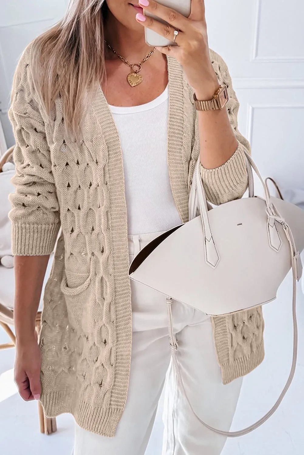 Jet Stream - Cardigan ample en tricot torsadé avec poches latérales et illets