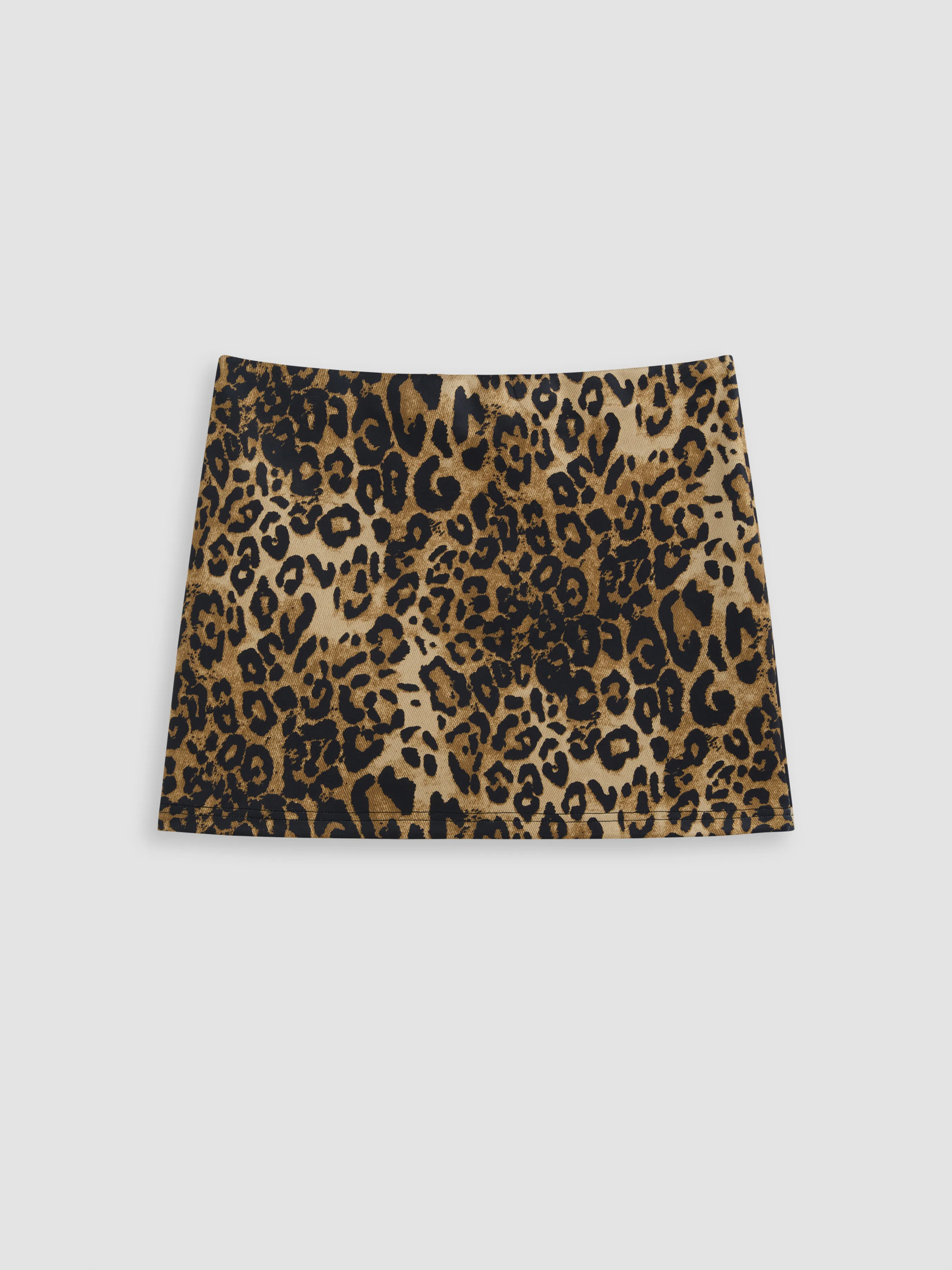Leopard print low-rise slit mini skirt.