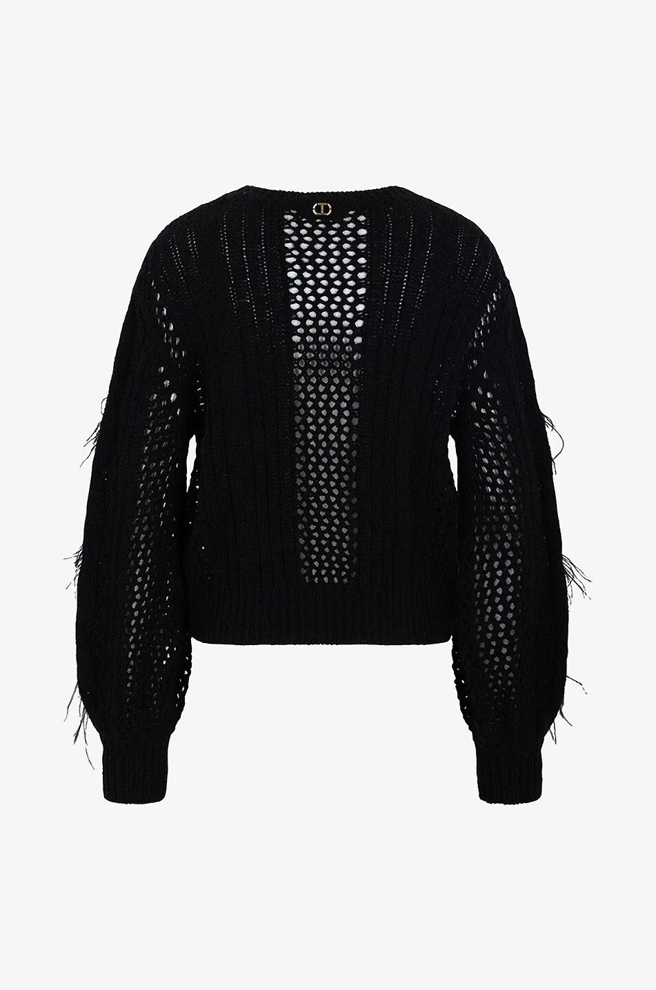 Pull ajouré orné de franges en plume