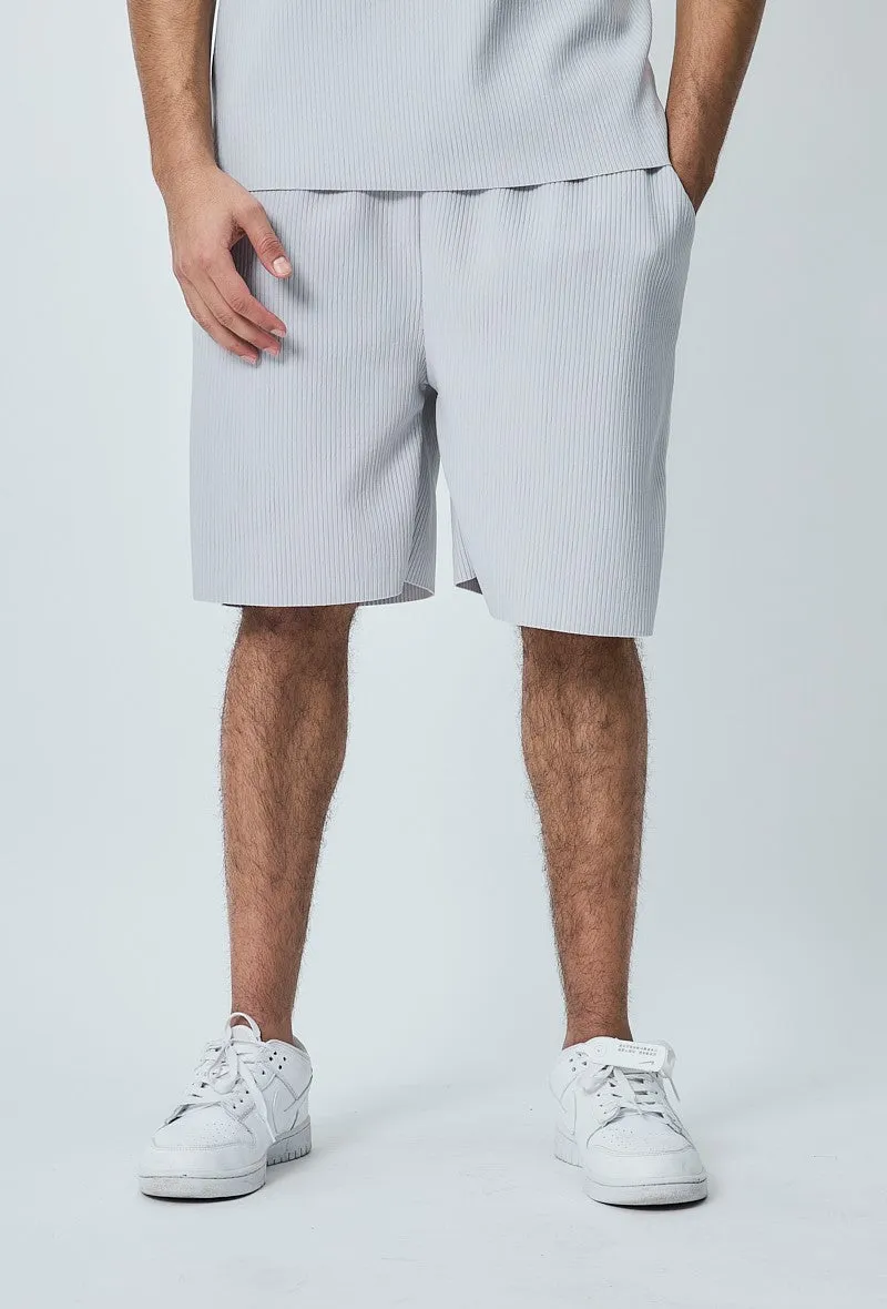 Short plissé oversize