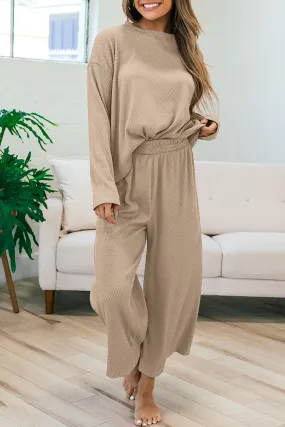 Tenue pull ample texturé et pantalon gris fumée